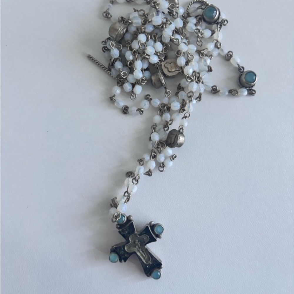 Virgin saint and angel 
Elegant Silver and Gold Cross Pendant Necklace